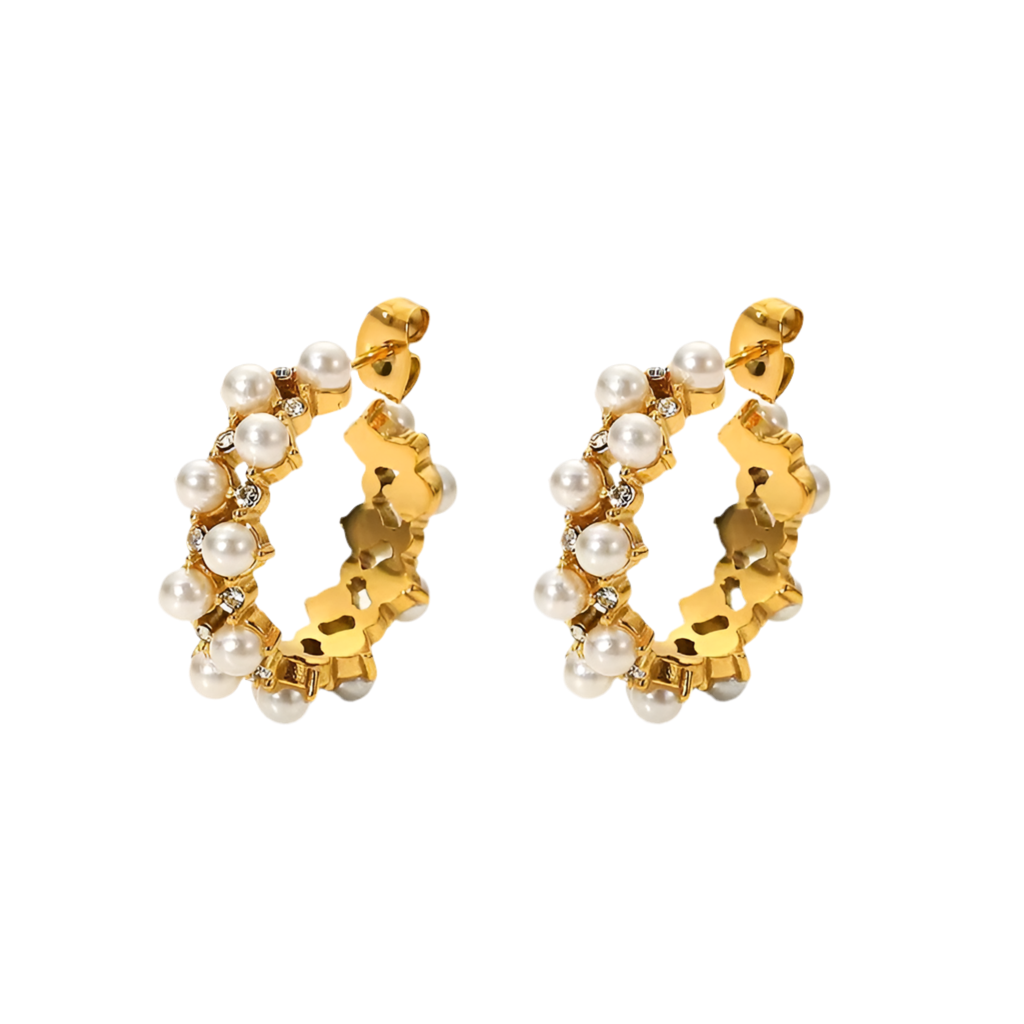 Gold hoop earrings with pearls on a white background