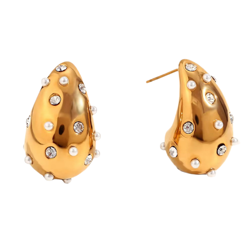 Gold earrings with pearl and crystal embellishments on a white background