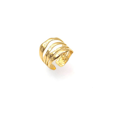 Gold ring with three bands on a white background
