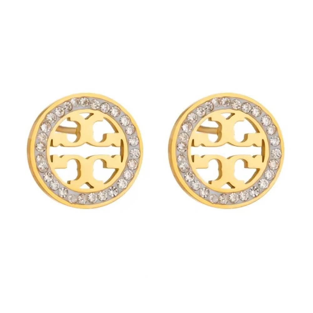 Gold earrings with circular design and embedded stones on a white background