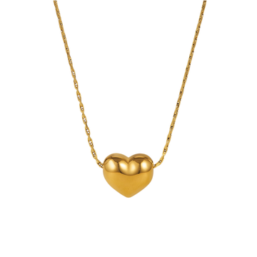 Gold heart-shaped pendant necklace on a white background