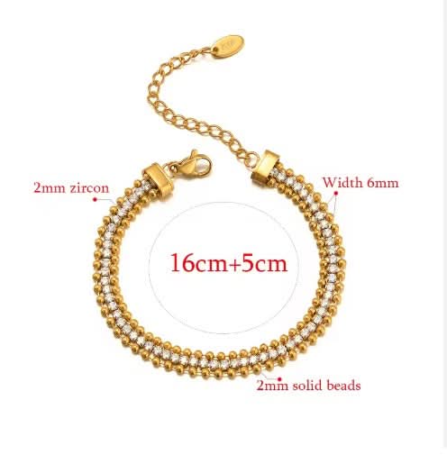 Gold bracelet with measurements on a white background