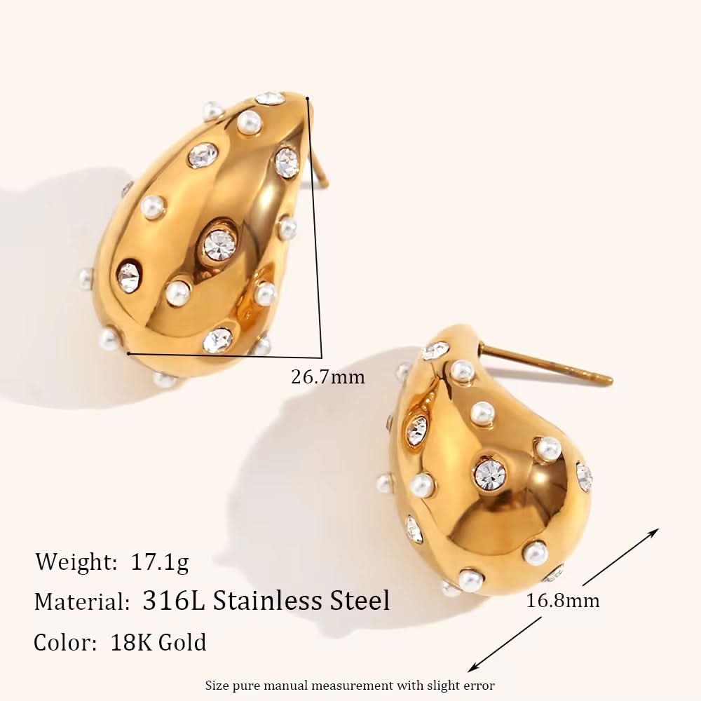 Gold earrings with gemstones on a white background, showing measurements and material details.