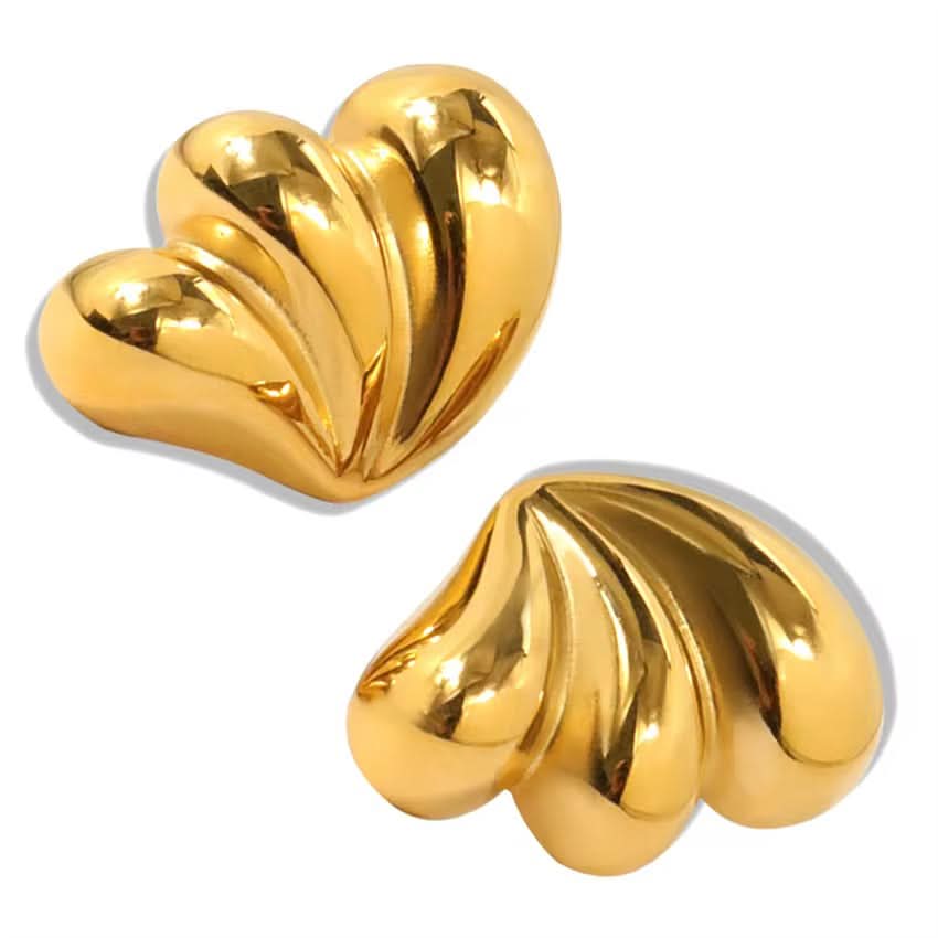 Pair of gold heart-shaped earrings on a white background