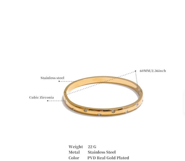 Gold bracelet with measurements and material details on a white background