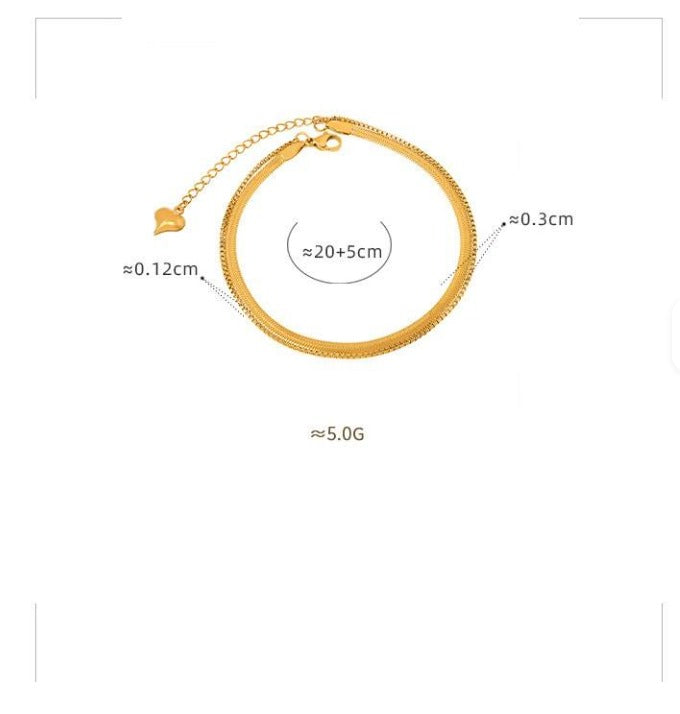 Gold bracelet with measurement details on a white background